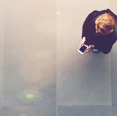 overhead view of woman holding phone